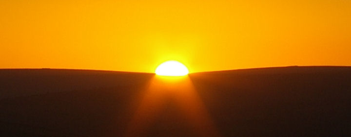 The sun setting over Dartmoor after a sunny and warm January day.