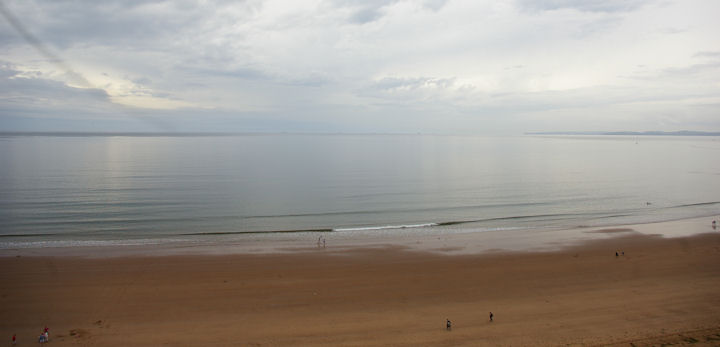 Sandy Bay near Exmouth on a warm and humid, but cloudy August day.