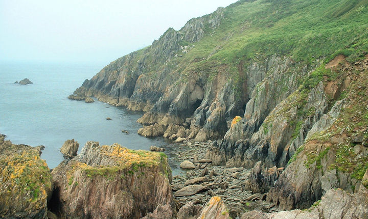 Jagged, slate-like rocks along the south coast of Devon. These are some of the oldest rocks in Devon at around 500 million years old.